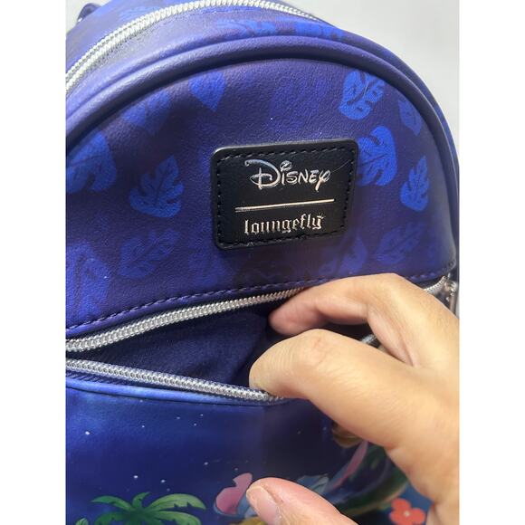 jack o lantern stitch mini backpack and Angel Pumpkin and Wallet  The Magic Bag Shopper Show off your playful side with the Loungefly Disney Stitch Devil Cosplay Mini Backpack Walt Disney Loungefly February Pre